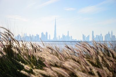 View of buildings against cloudy sky