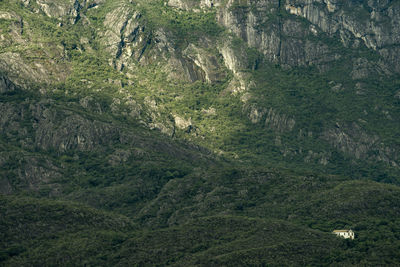 Small church among the huge mountains of santuario do caraca.