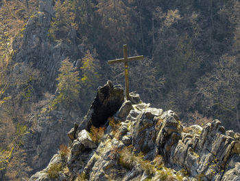 Panoramic view of cross on rock formation