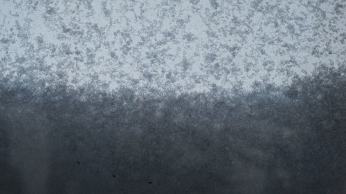 Full frame shot of snow covered land