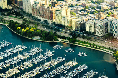 High angle view of cityscape by reflection in city