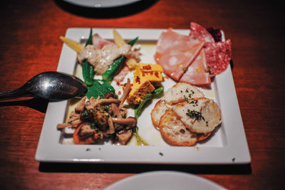 High angle view of food served on table