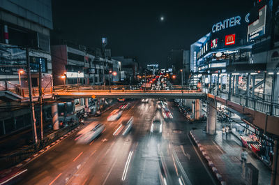 High angle view of light trails on road at night