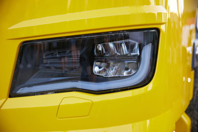 Close-up of yellow car