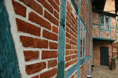 Close-up of text on wall of building