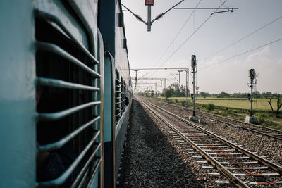 Railroad tracks against sky