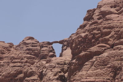 Scenic view of rocky mountains against clear sky