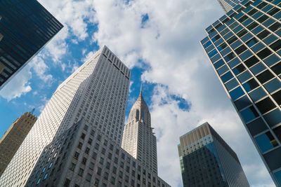 Low angle view of modern buildings against sky