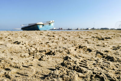 Scenic view of beach against clear sky