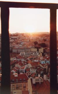 High angle view of townscape against sky during sunset