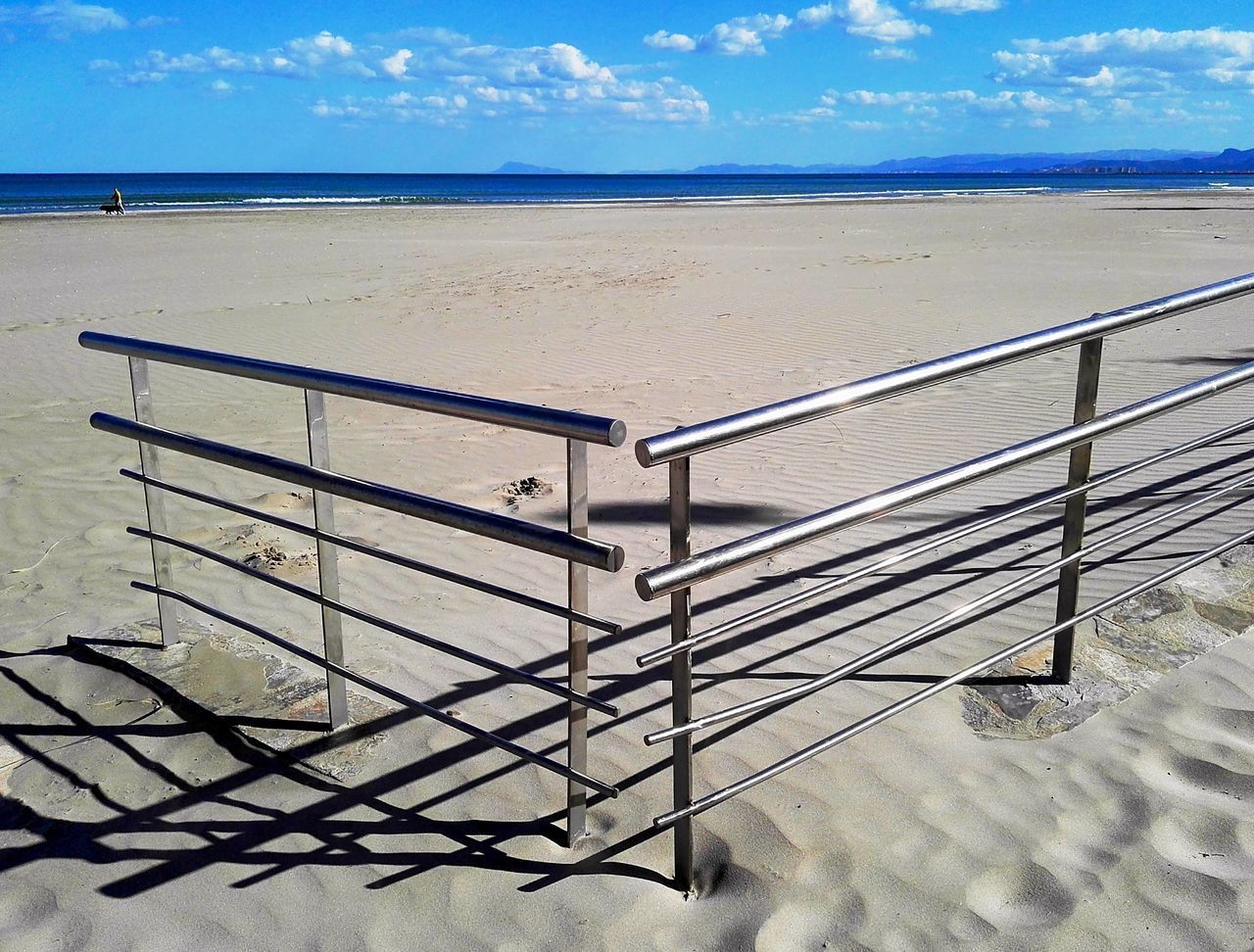 LIFEGUARD HUT ON BEACH AGAINST SKY