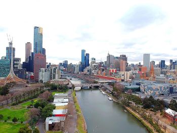 Modern buildings in city against sky