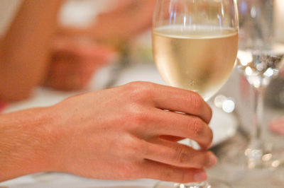 Close-up of hand holding drink