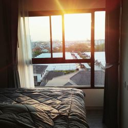 Close-up of curtain on bed at home