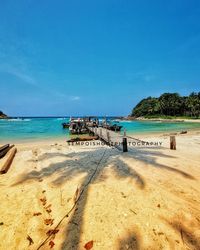 Scenic view of beach against clear sky