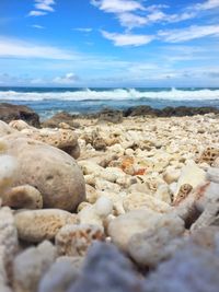 Scenic view of calm sea against blue sky