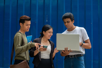 Young man using smart phone