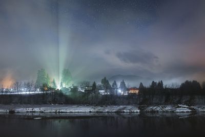 Panoramic view of lake against sky during winter