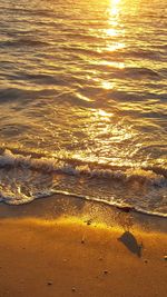 Scenic view of sea against sky at sunset