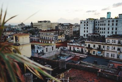 High angle view of buildings in city against sky