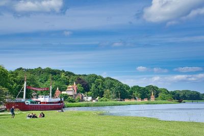 Boats in sea against sky