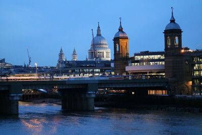 View of illuminated city against clear sky