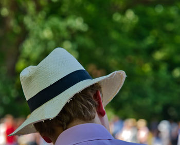 Rear view of man and woman wearing hat