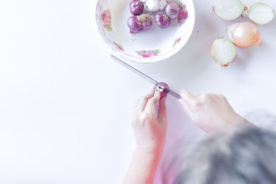 High angle view of woman preparing food