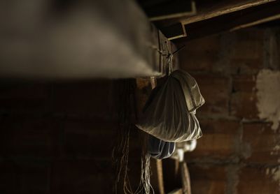 Close-up of rope tied to wall