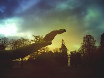 Scenic view of landscape against cloudy sky