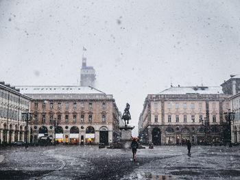 Buildings in city during winter