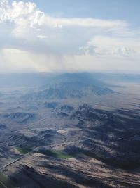 Aerial view of dramatic landscape against sky