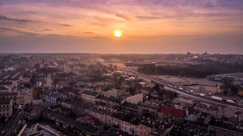 High angle view of cityscape against sky during sunset