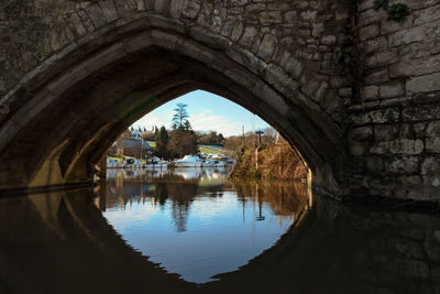 Reflection of arch in lake