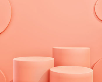 Close-up of empty tea cup on table against wall