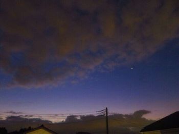 Scenic view of landscape against sky at night