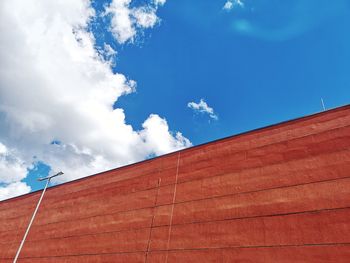 Low angle view of building against blue sky