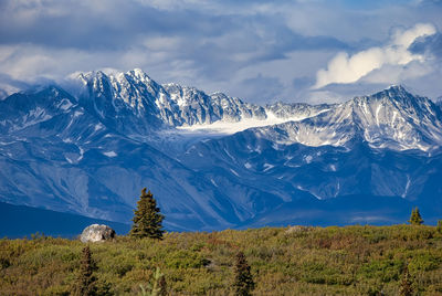 Scenic view of snowcapped mountains against sky