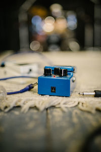 Blue guitar effect on stage closeup.