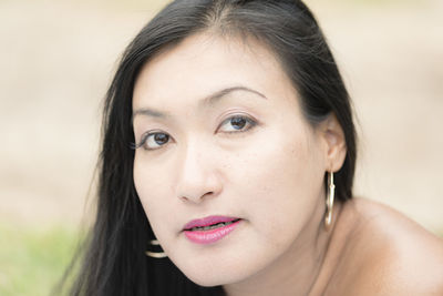 Close-up portrait of woman with make-up