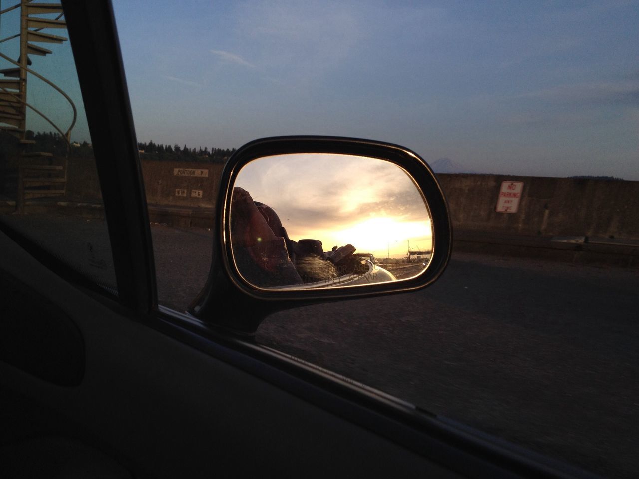 transportation, mode of transport, car, land vehicle, sky, side-view mirror, road, sunset, reflection, glass - material, vehicle interior, transparent, cloud - sky, street, travel, car interior, window, cloud, on the move, windshield