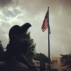 Low angle view of statue against sky