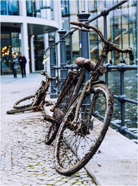 Bicycle on street in city during winter