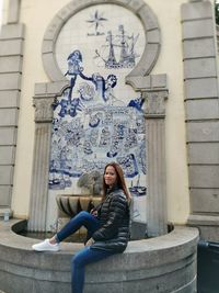 Woman sitting in a building