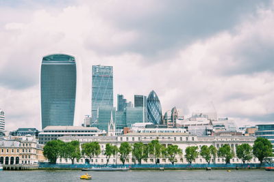 View of city against cloudy sky