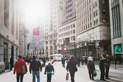 People walking on city street