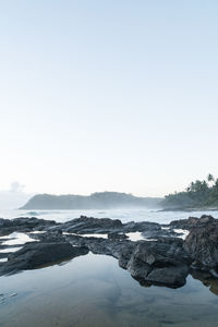 Scenic view of sea against clear sky