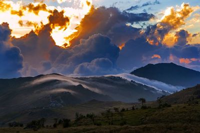 Scenic view of mountains against sky during sunset