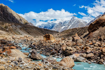 Scenic view of snowcapped mountains against sky