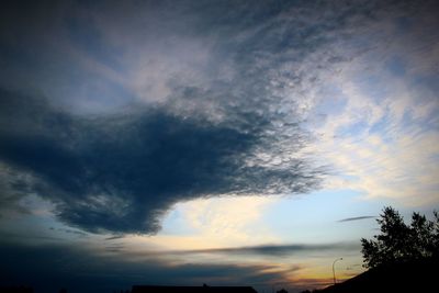 Low angle view of dramatic sky during sunset